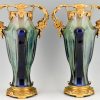 Impressive pair of Art Nouveau ceramic and bronze vases