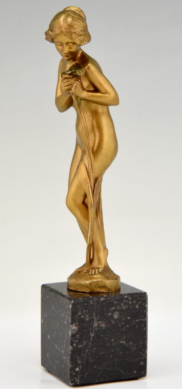 Art Nouveau bronze sculpture nude with flower