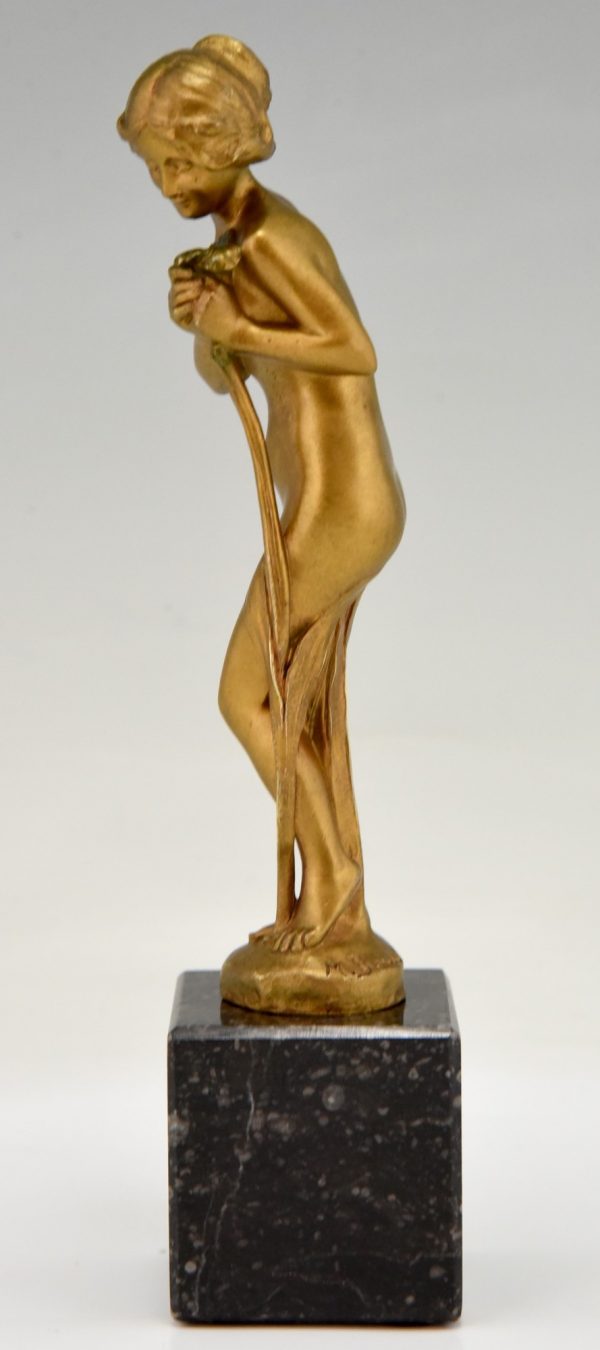 Art Nouveau bronze sculpture nude with flower