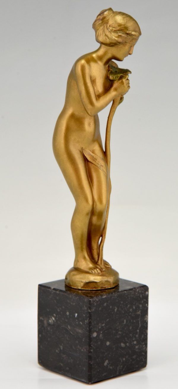 Art Nouveau bronze sculpture nude with flower