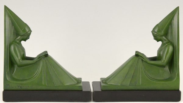 Art Deco bookends reading Medieval ladies