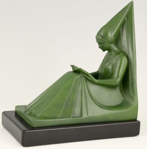 Art Deco bookends reading Medieval ladies