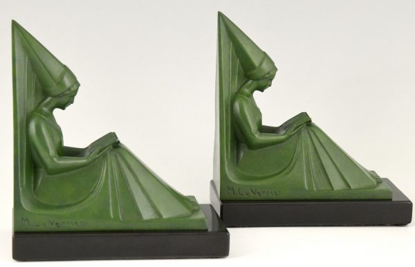 Art Deco bookends reading Medieval ladies