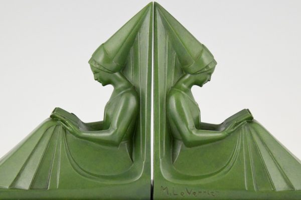 Art Deco bookends reading Medieval ladies