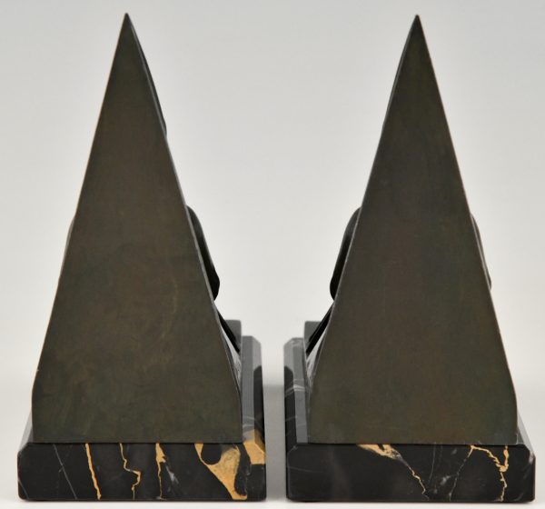 Art Deco bookends reading Medieval ladies