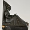 Art Deco bookends reading Medieval ladies