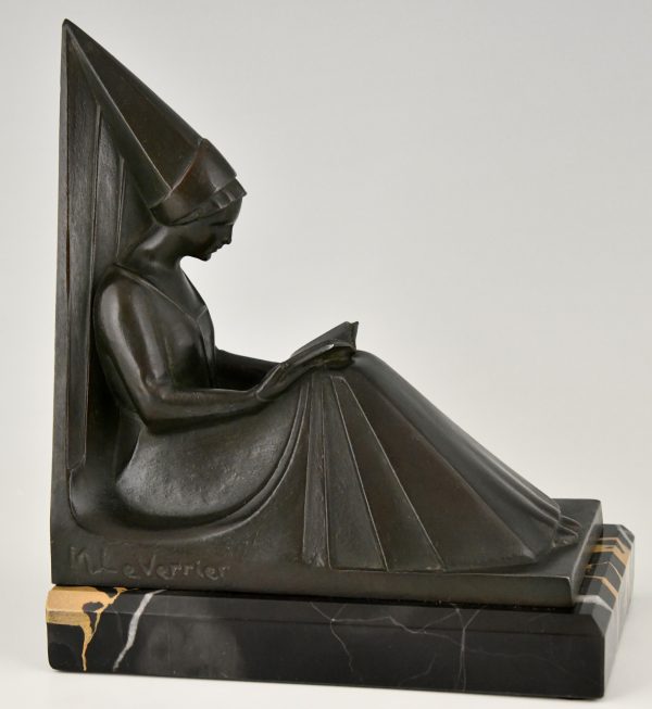 Art Deco bookends reading Medieval ladies