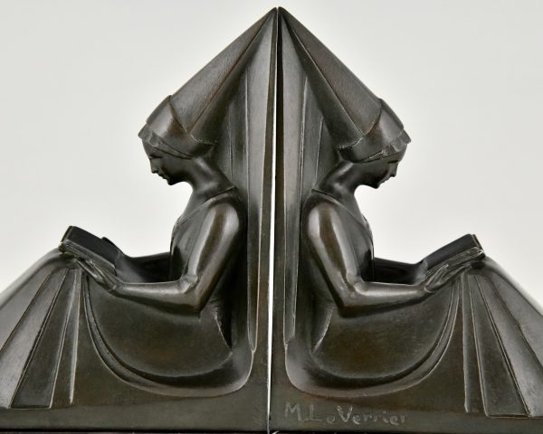 Art Deco bookends reading Medieval ladies