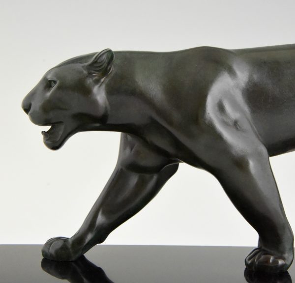 Art Deco sculpture of a walking panther