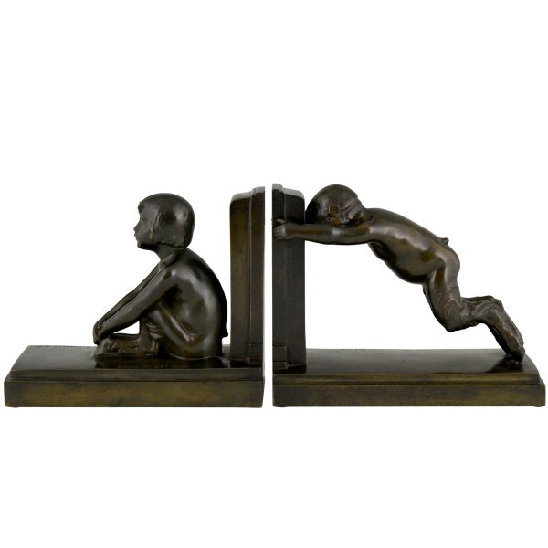 Art Deco bronzen boekensteunen jonge saters