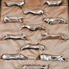 Art Deco set of 12 silvered animal knife rests in case