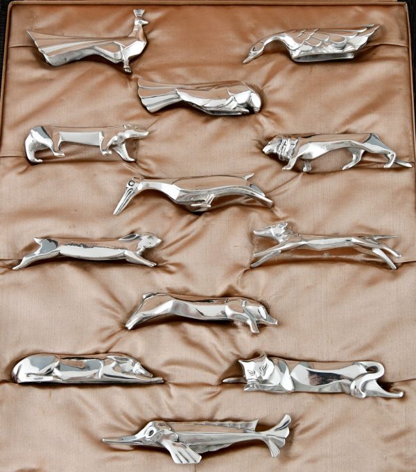 Art Deco set of 12 silvered animal knife rests in case