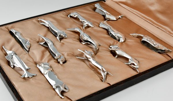 Art Deco set of 12 silvered animal knife rests in case