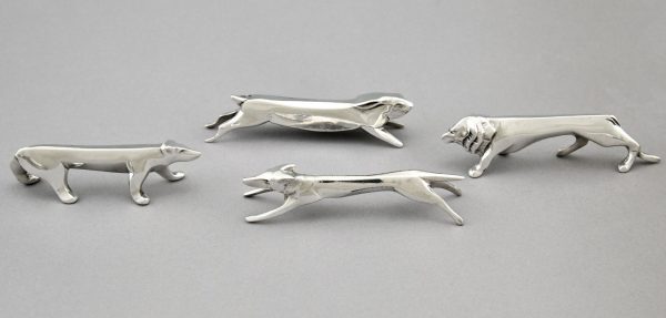 Art Deco 12 porte couteaux animaux metal argenté dans écrin