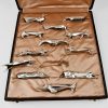 Art Deco set of 12 silvered animal knife rests in case
