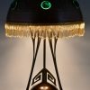 Art Nouveau copper, brass and glass cabochons table lamp