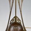 Art Nouveau lamp in koper met glas cabochons
