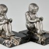 Art Deco bronzen boekensteunen met lezende meisjes