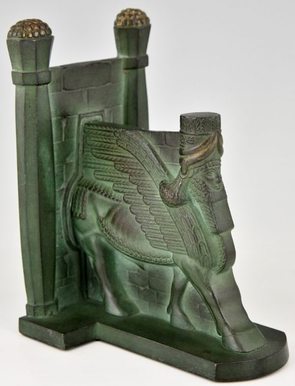 Art Deco serre livres en bronze Lamassu