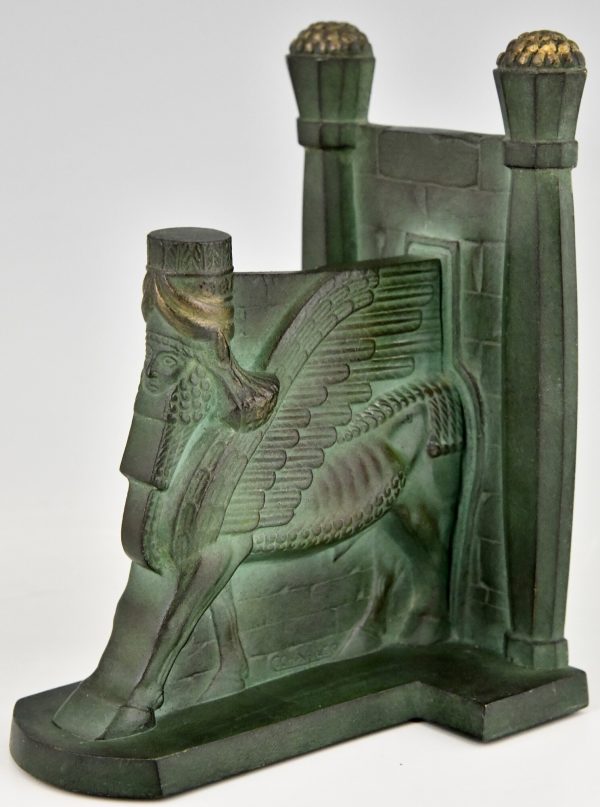 Art Deco serre livres en bronze Lamassu