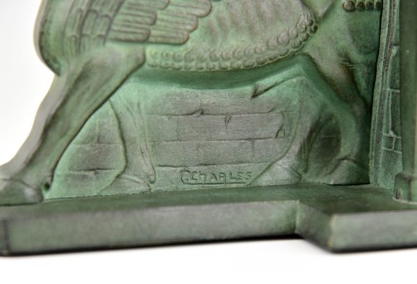 Art Deco serre livres en bronze Lamassu