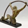 Art Deco sculpture bending bar man l’age du bronze