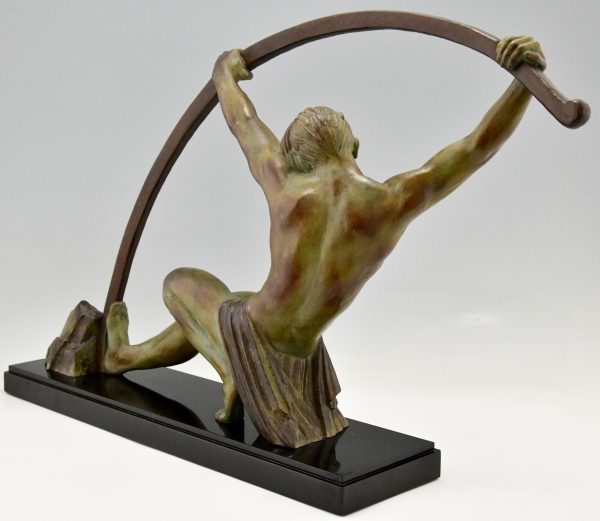 Art Deco sculpture “l’age du bronze” homme avec barre