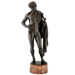 Orpheus Antique bronze sculpture of a male nude with lyre and cape.