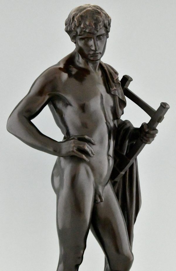 Orpheus Antique bronze sculpture of a male nude with lyre and cape.