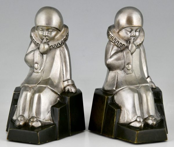 Art Deco bronzen boekensteunen met pierrots