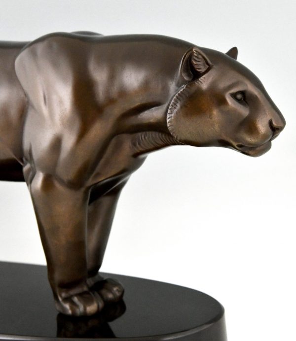 Art Deco sculpture of a panther on oval base