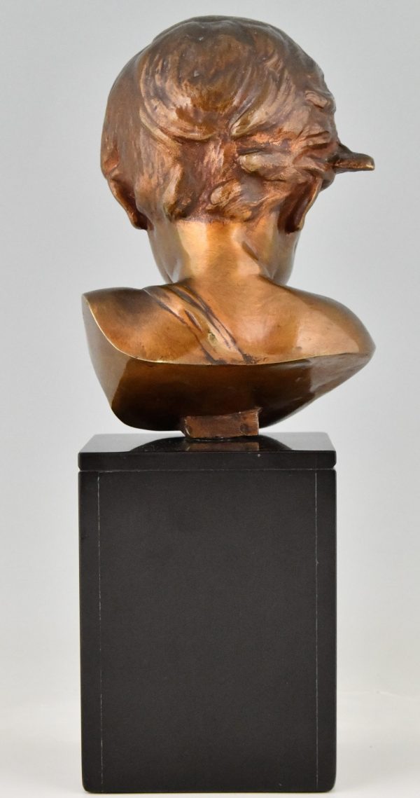 Antique bronze sculpture bust of a boy, cupid.
