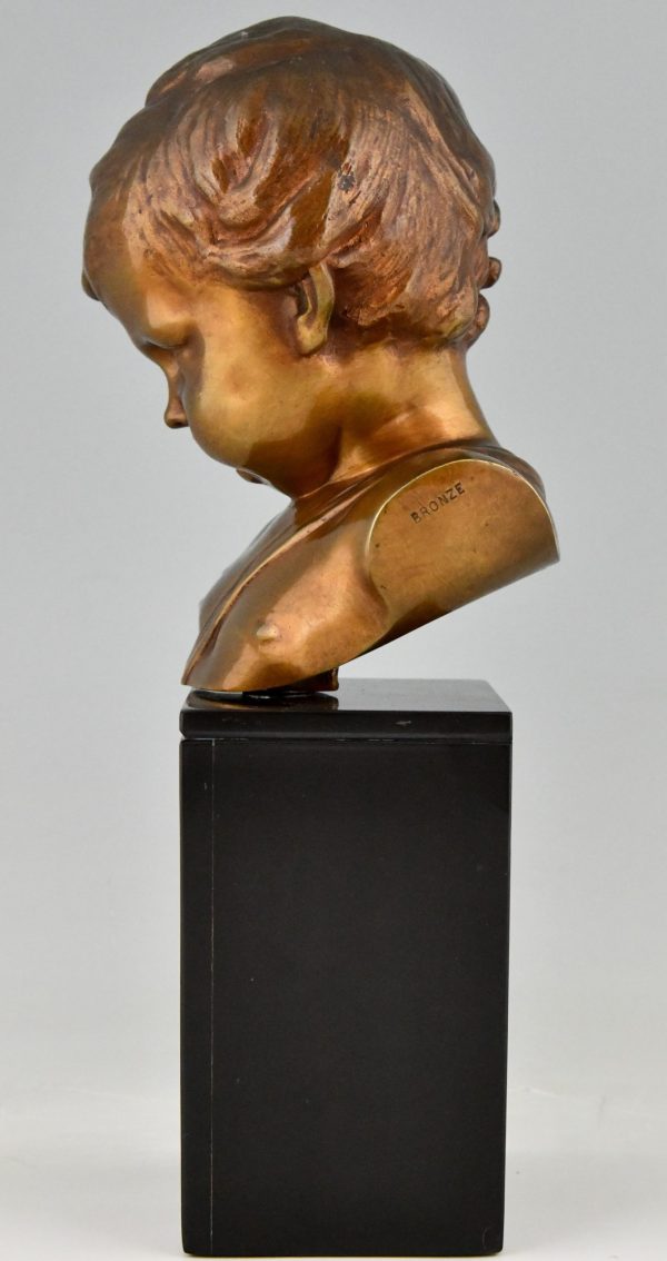Antique bronze sculpture bust of a boy cupid.