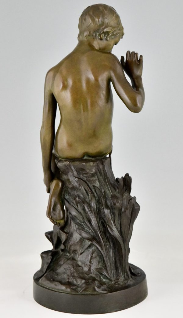 Antique bronze sculpture boy with lizard