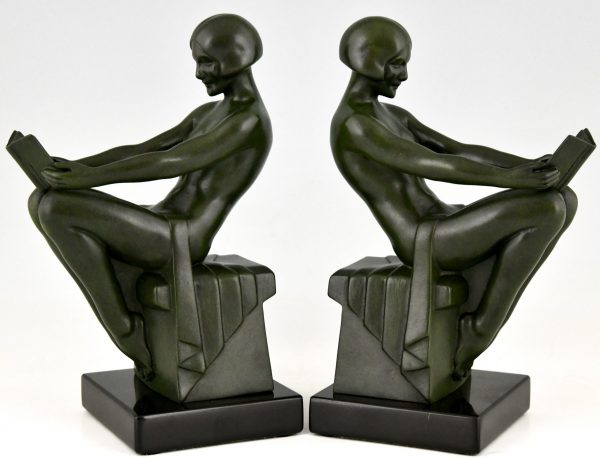 Art Deco boekensteunen met lezende vrouwen Delassement