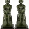 Art Deco bookends with reading nudes Delassement