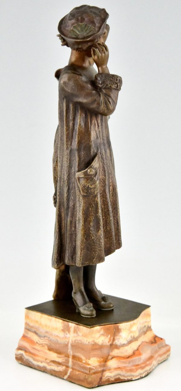 Art Deco bronze sculpture of lady with hat