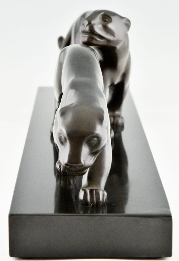 Art Deco bronze sculpture of two panthers