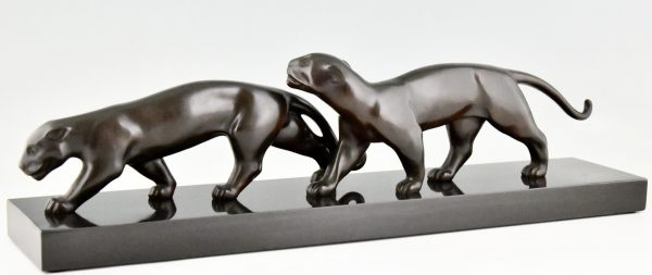 Art Deco bronze sculpture of two panthers