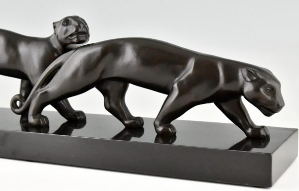 Art Deco bronze sculpture of two panthers