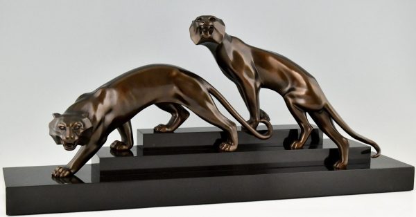 Art Deco bronze sculpture of two panthers.