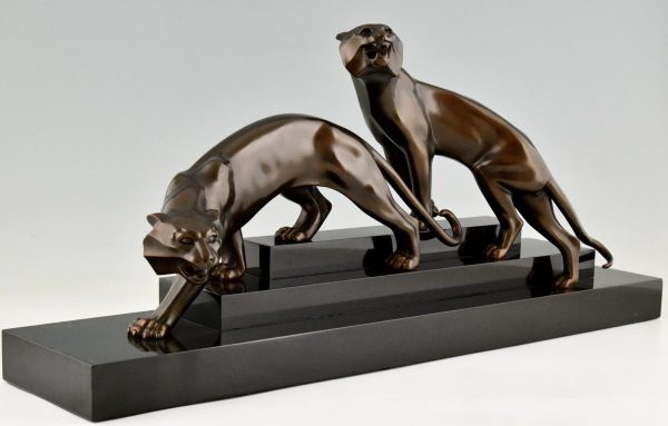 Art Deco bronze sculpture of two panthers.