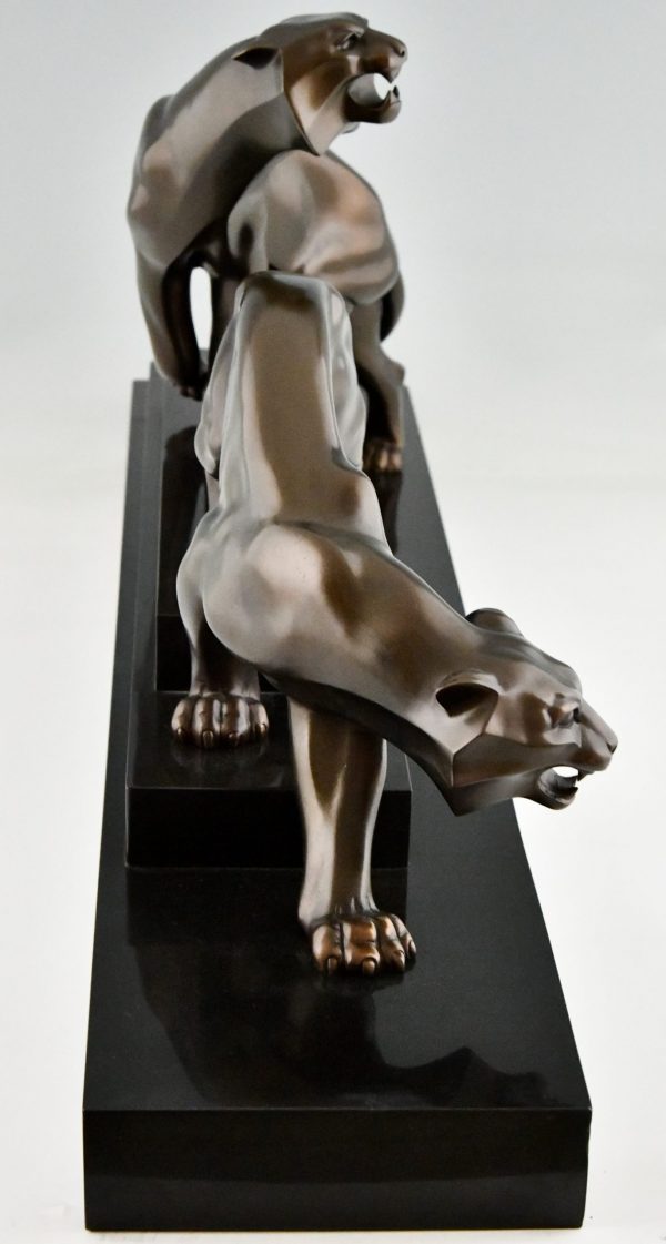 Art Deco bronze sculpture of two panthers.