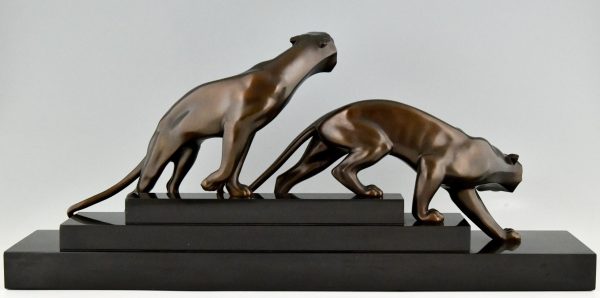 Art Deco bronze sculpture of two panthers.