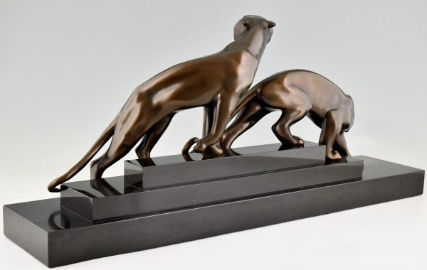 Art Deco bronze sculpture of two panthers.