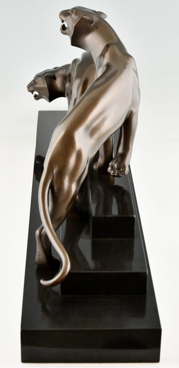 Art Deco bronze sculpture of two panthers.