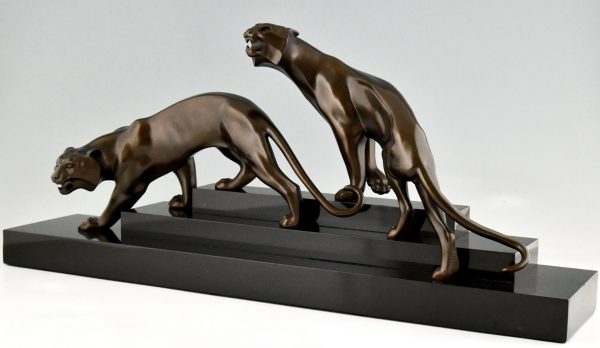 Art Deco bronze sculpture of two panthers.