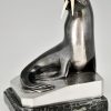 Art Deco bronzen boekensteunen met walrussen.