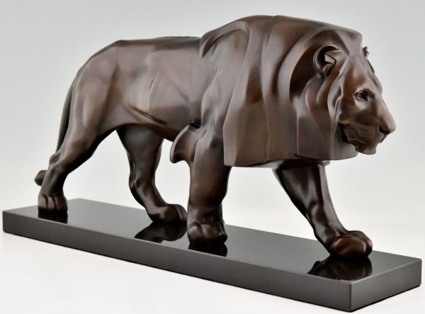 Art Deco style sculpture of a walking lion.