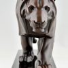 Art Deco style sculpture of a walking lion.